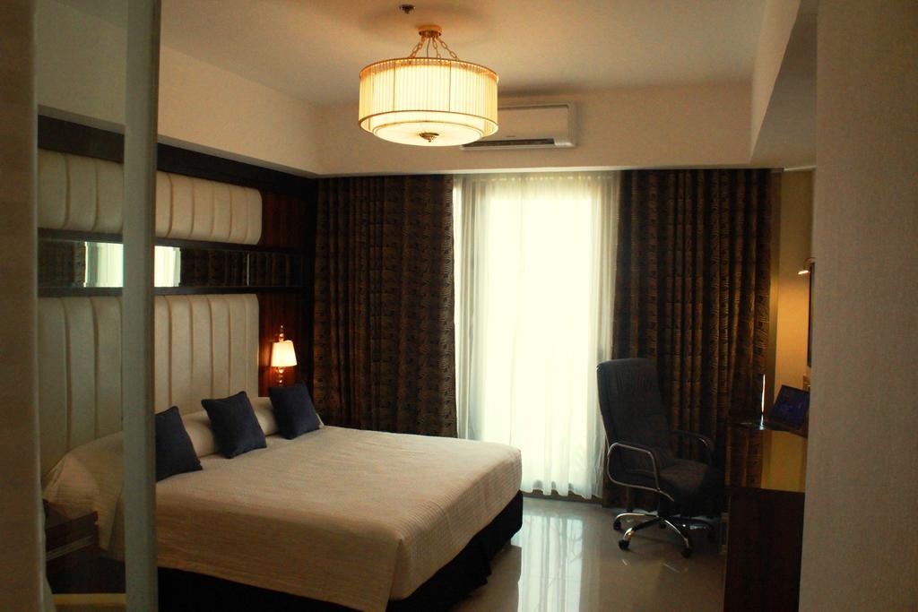 Central Park Tower Resort Angeles Pokoj fotografie